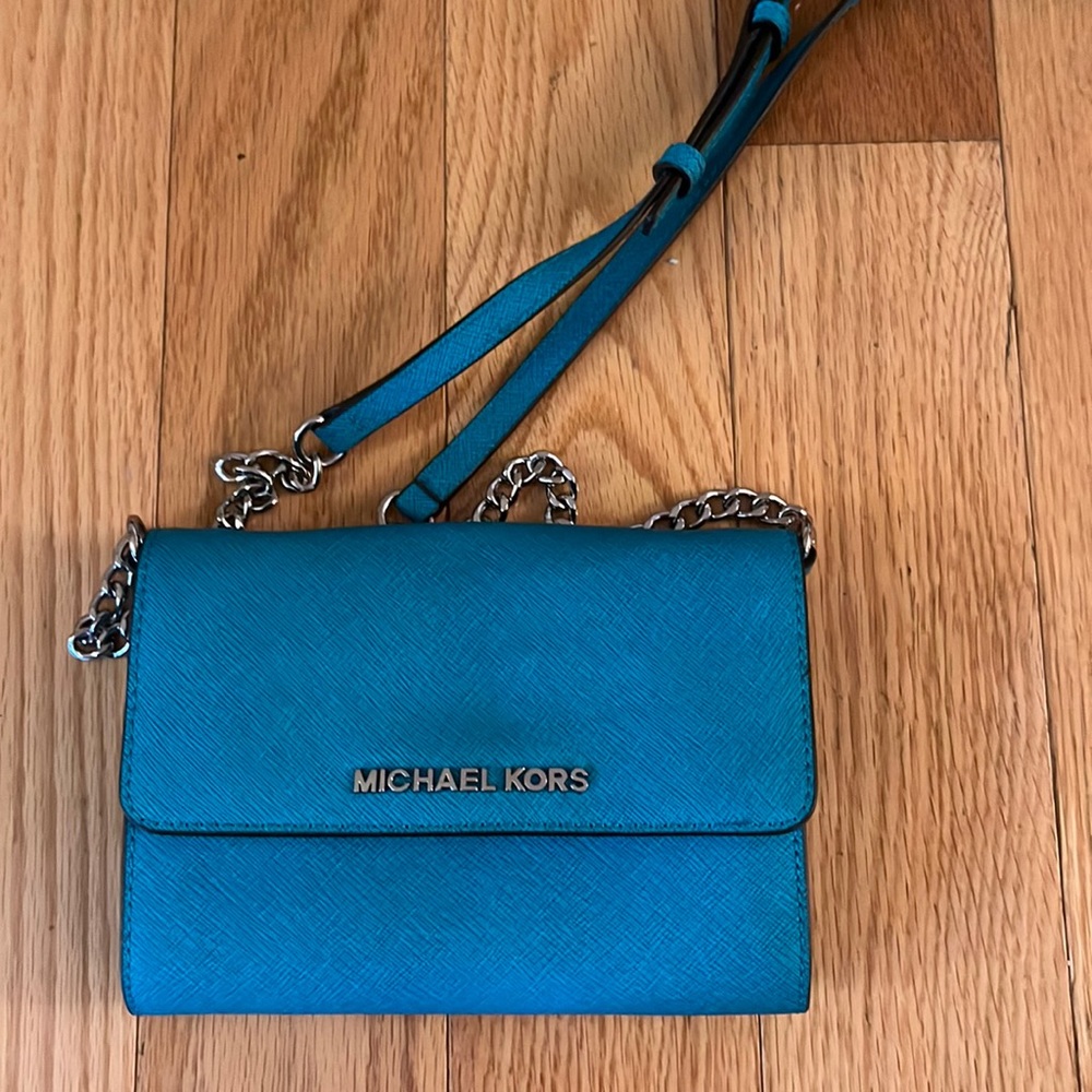 Micheal Kohrs cross body